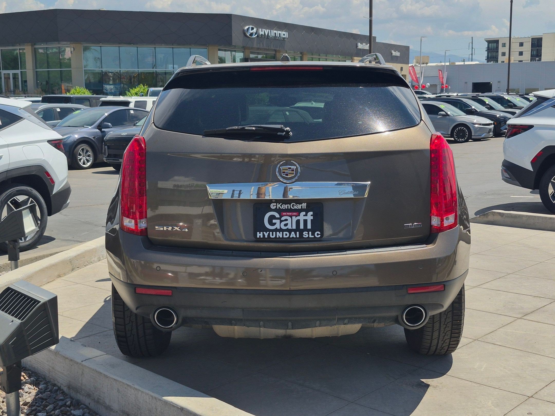 Used 2014 Terra Mocha Metallic Cadillac Luxury Collection image 5