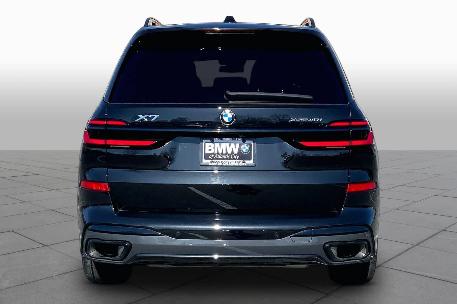 Certified Used 2024 Black Sapphire Metallic BMW xDrive40i image 4