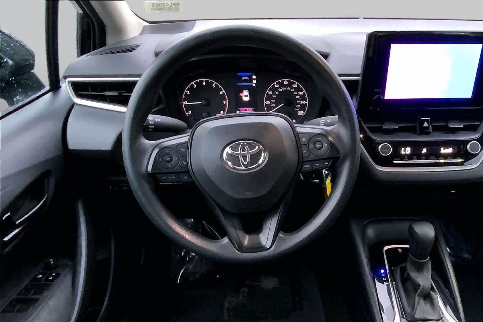 Used 2024 Midnight Black Metallic Toyota LE image 6