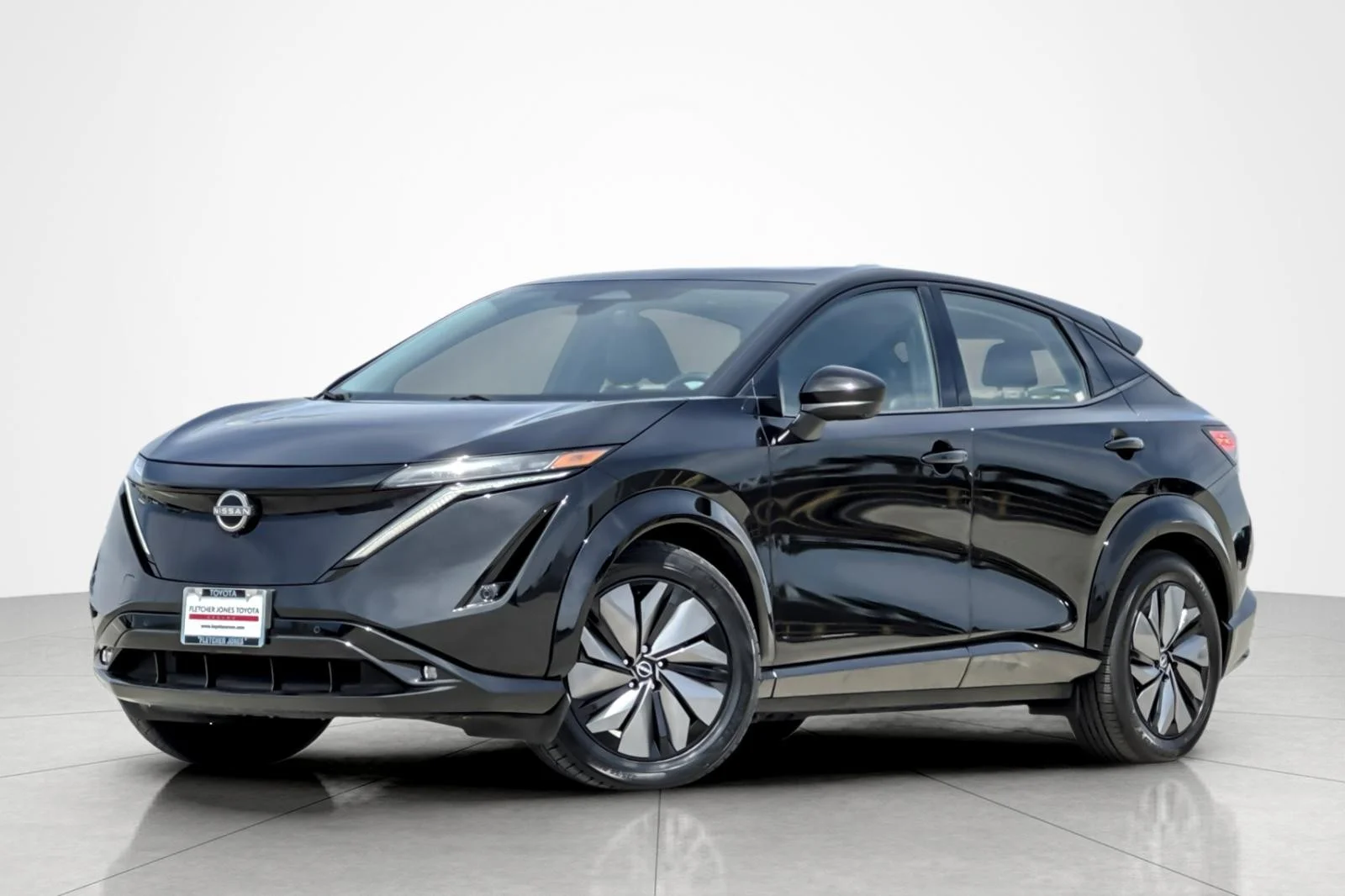 Used 2024 Black Diamond Pearl Nissan EVOLVE+ image 1