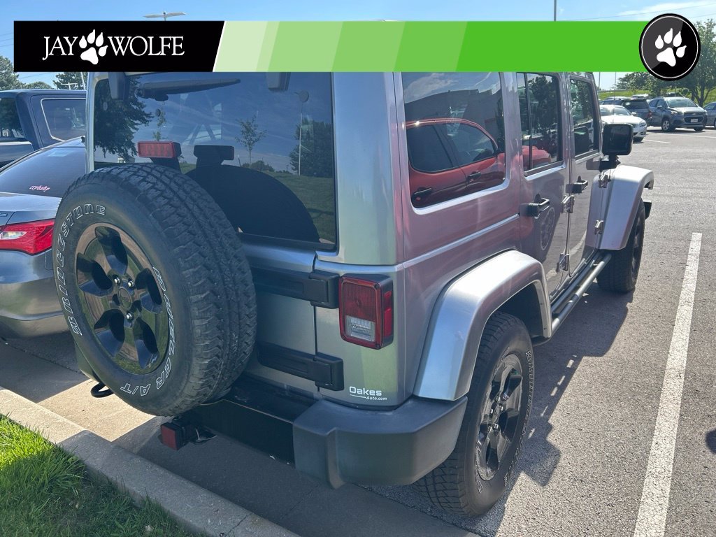 Used 2015 Silver Jeep Unlimited Sahara image 4