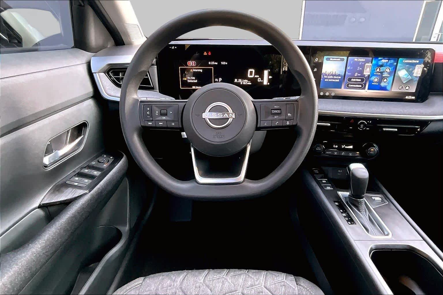 Used 2026 Aspen White Tricoat/Super Black Nissan SV image 6