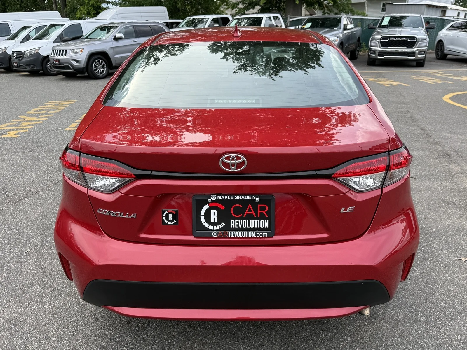 Used 2021 Barcelona Red Metallic Toyota LE image 5