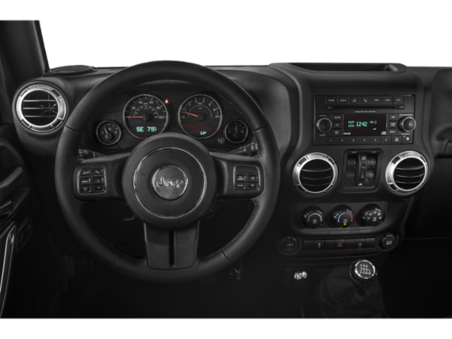 Used 2015 Black Clearcoat Jeep Sahara image 4
