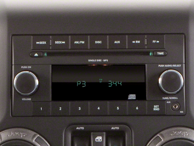 Used 2010 Red Rock Crystal Pearl Jeep Sahara image 10