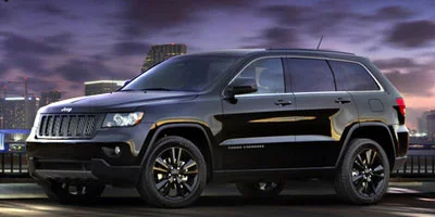 Used 2012 Black Jeep Laredo image 1