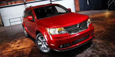 Used 2012 Brilliant Red Tri-Co Dodge SXT image 1