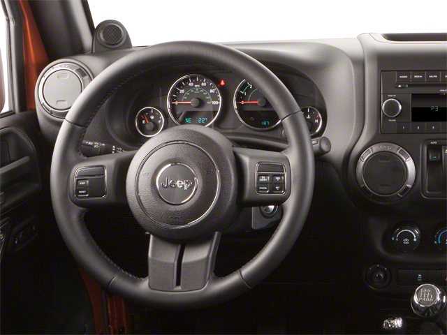 Used 2010 Red Rock Crystal Pearl Jeep Sahara image 6