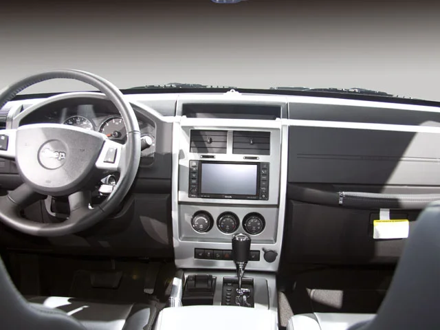 Used 2010 Bright Silver Metallic Jeep Sport image 2